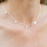 CIRCLE DISC MULTI-CHARM NECKLACE