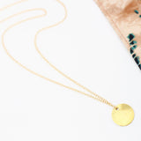 LONG BRUSHED DISC NECKLACE
